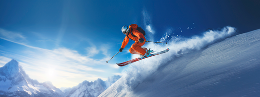 Skifahrer bei der Abfahrt auf der Piste