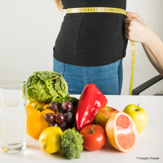 Frau Maßband abnehmen und Gemüse