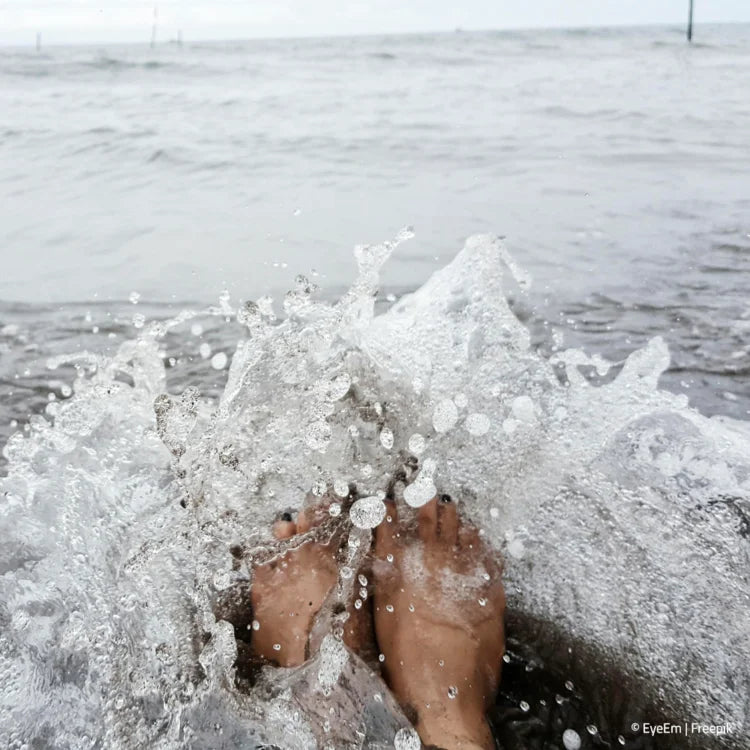 Füße im Meer